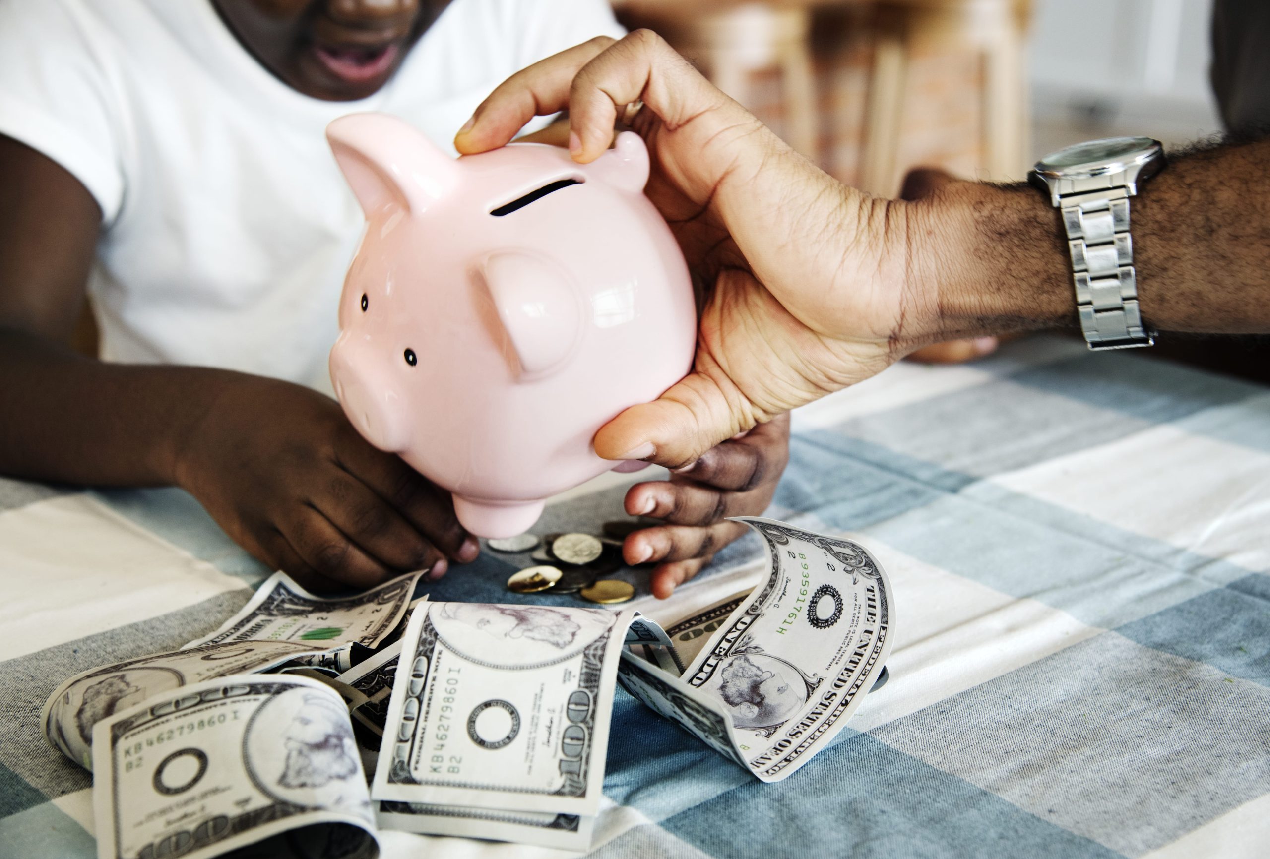 Cost of living comparison preview for Ghana travel tools with family saving money