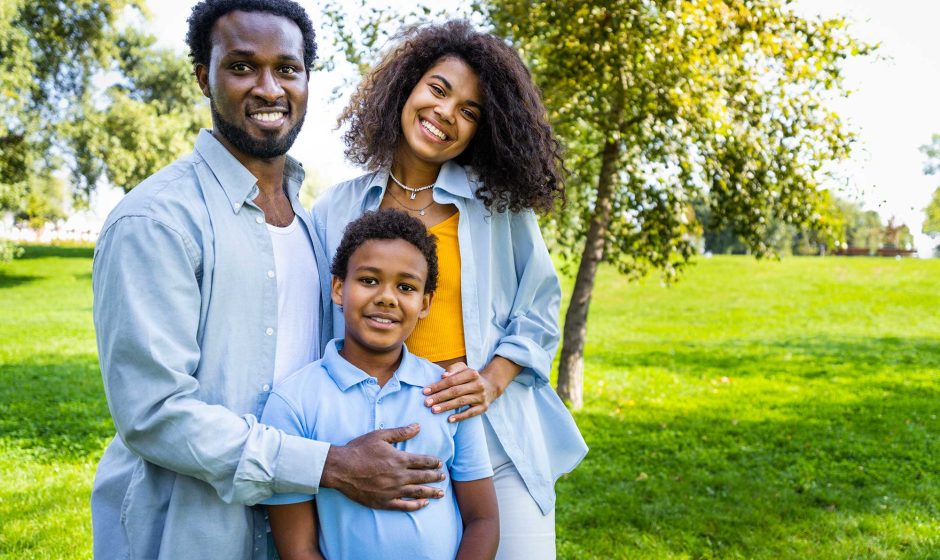 Beautiful happy african american family bonding at the park