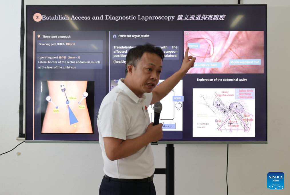 Yang Yongguang, head of the 14th Chinese medical team in Ghana, leads a laparoscopic surgery training session at Lekma Hospital in Accra on Jan. 12, 2026.