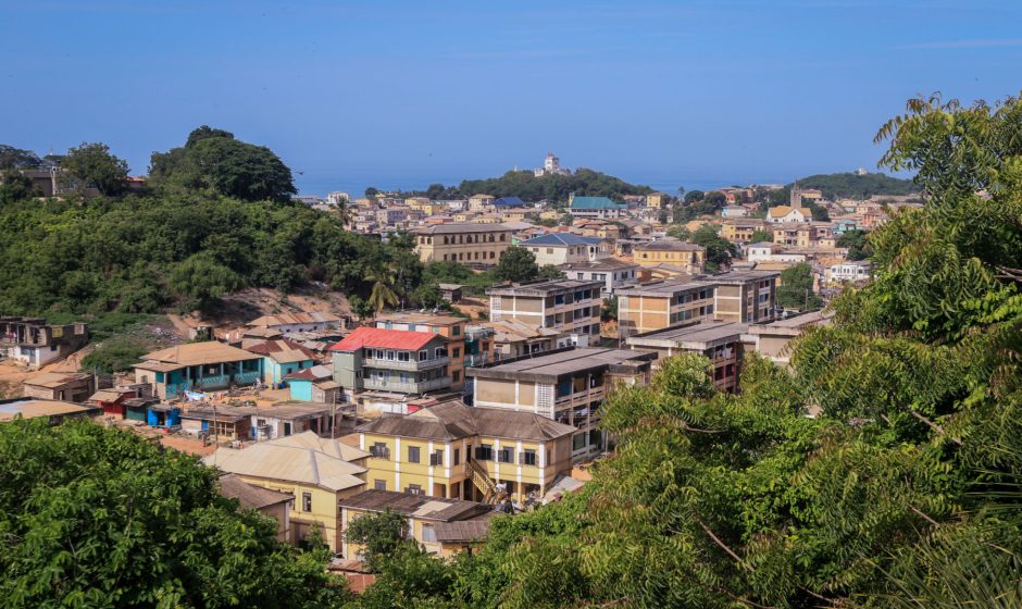 Panoramic view of Cape Coast Ghana downtown houses surrounded by green trees