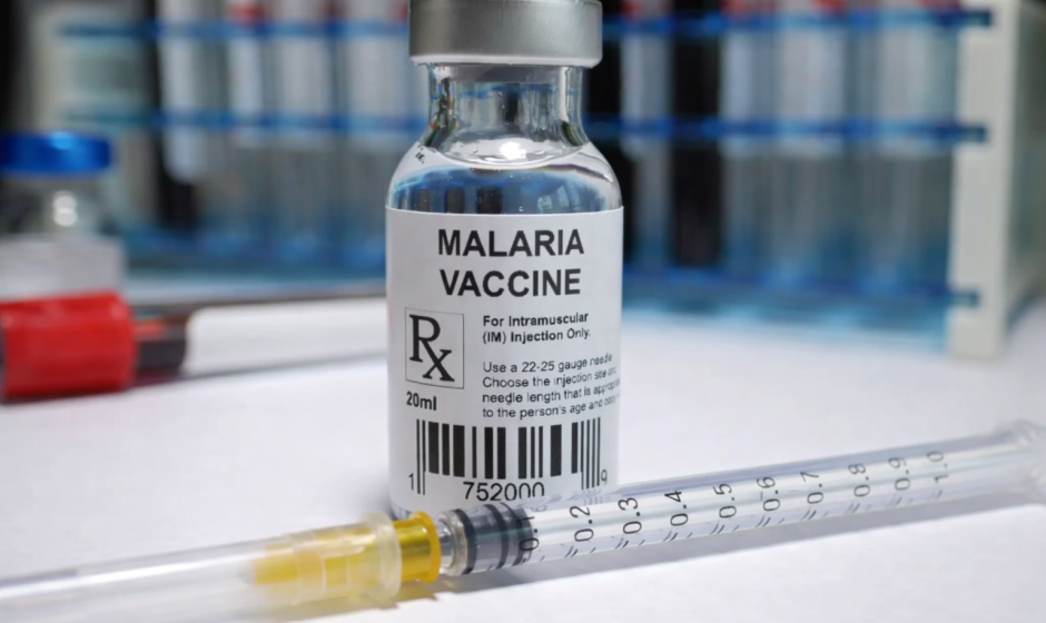 Malaria vaccine vial and syringe used for travel health preparation before visiting Ghana