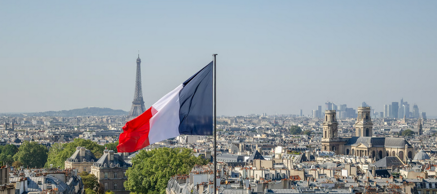 French flag over Paris skyline representing African countries divesting from France and changing ties in 2026