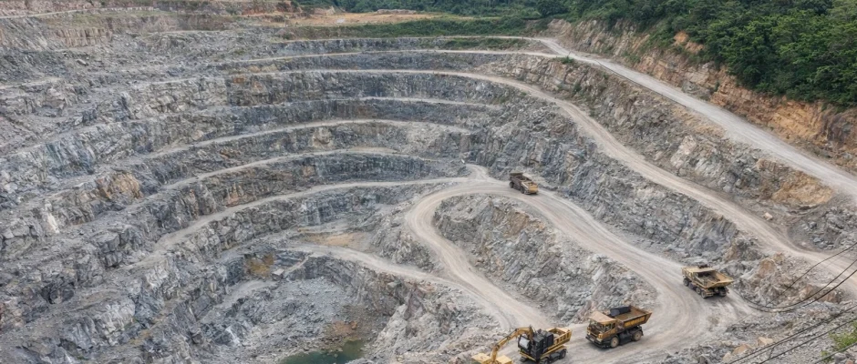 Aerial view of the Bogoso-Prestea gold mine in southwestern Ghana showing terraced open pit excavation and access roads.