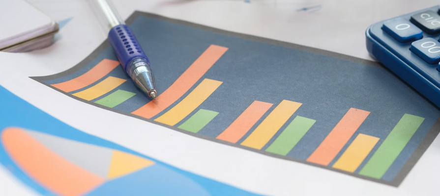 Ghana credit rating upgrade concept with financial chart calculator and investment analysis tools