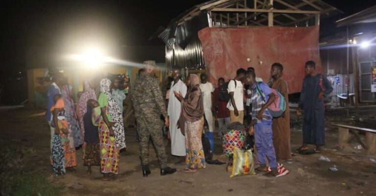 Kumasi immigration sweep operation in Ghana as officers question undocumented migrants during a nighttime enforcement raid in Kumasi.