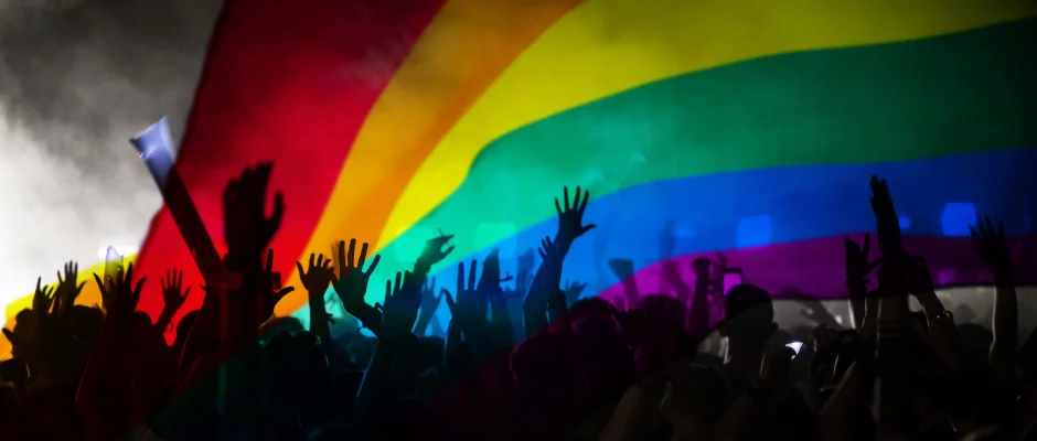 LGBT rainbow flag with silhouettes representing LGBT community in Ghana