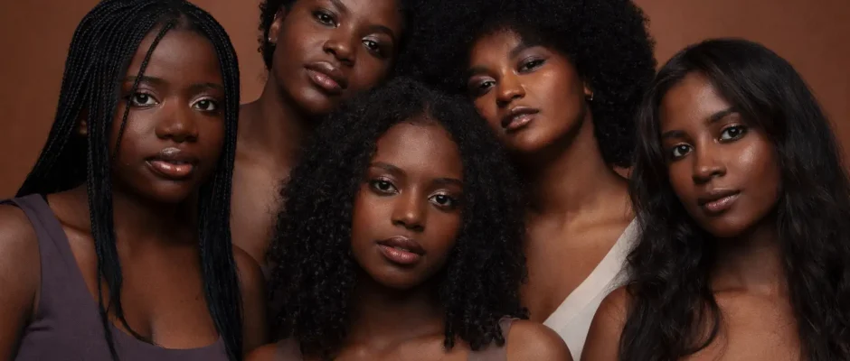 Black American women in Ghana smiling together in Accra during relocation journey