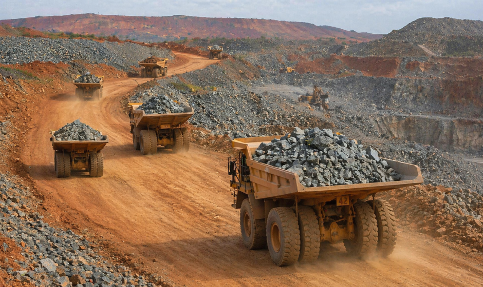 Mining trucks hauling rock at the Damang mine site in Ghana during the Damang mine takeover Ghana story
