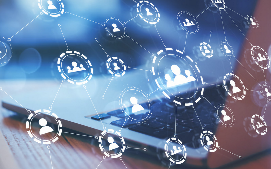 Social network concept showing connected user icons over a laptop, representing Ghana WhatsApp and Telegram groups for diaspora and expats