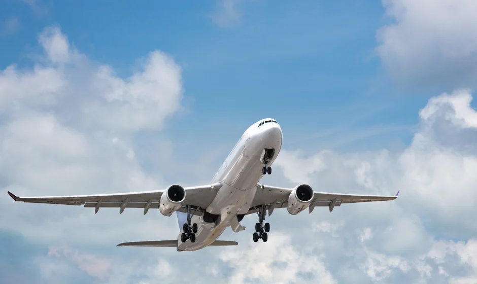 New national airline Ghana – commercial airplane flying over West African landscape