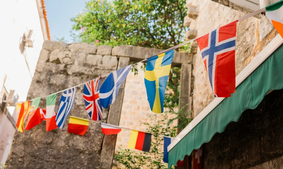 European flags in city street representing where Ghanaians live in Europe