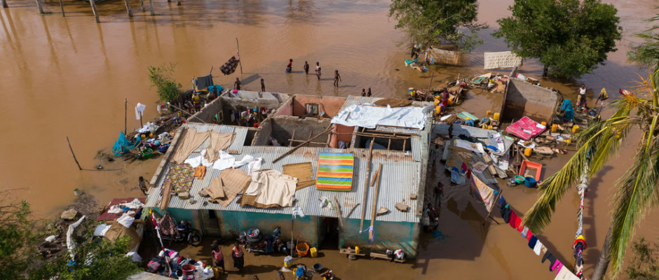 Flooded residential area in Ghana showing severe flood risk to homes and communities