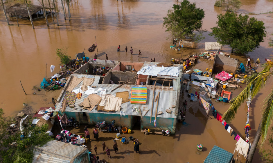Flooded residential area in Ghana showing severe flood risk to homes and communities