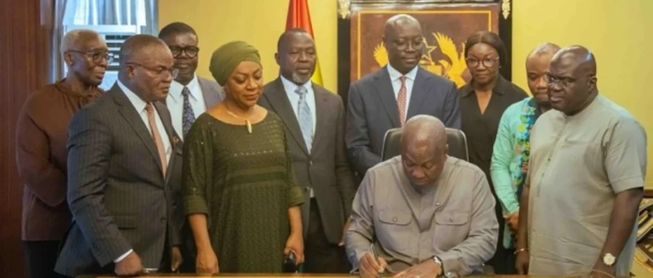 Ghana legal education reform signing ceremony at Jubilee House with officials gathered around the President
