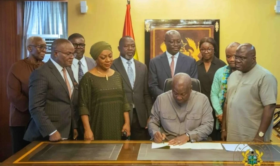 Ghana legal education reform signing ceremony at Jubilee House with officials gathered around the President