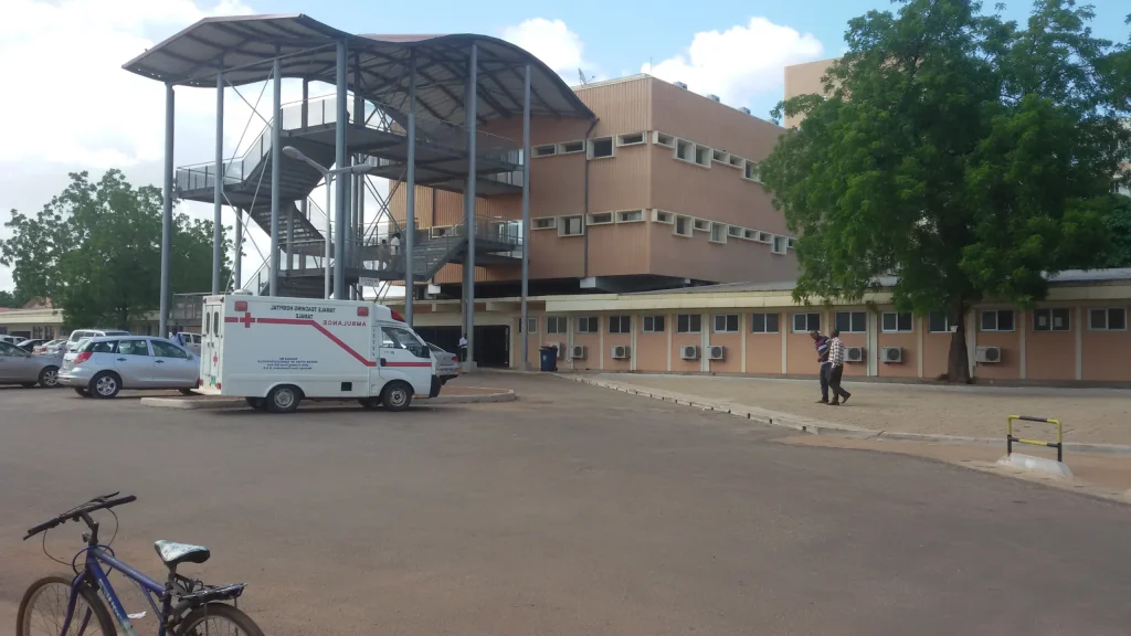 View of Tamale Teaching Hospital showing entrance and ambulance