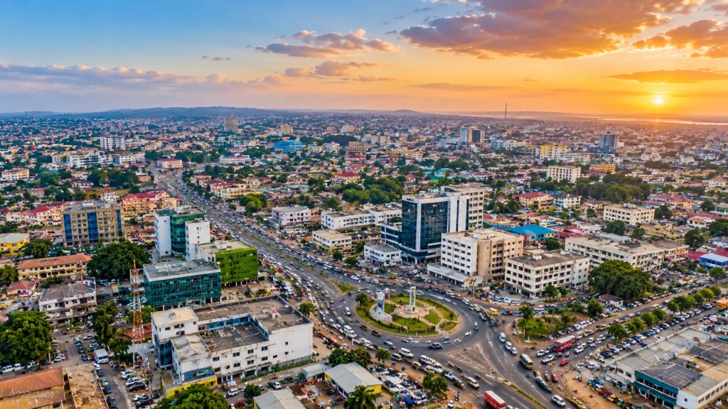 Ghana City Skyline at Sunset – 4K Aerial Wallpaper
